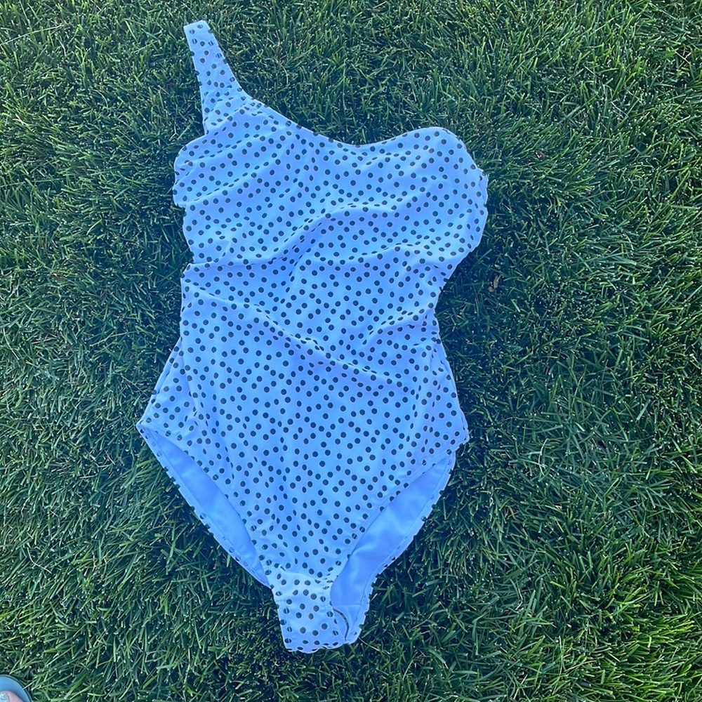 Ivory Rose one shoulder swimsuit in white polka dot.